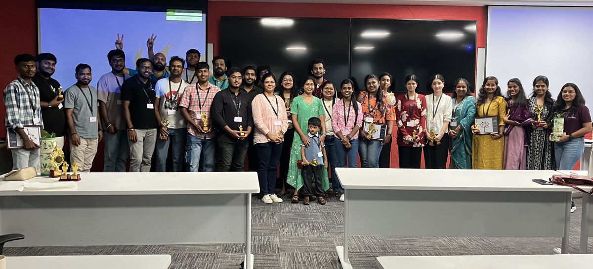 Optimists holding their trophies and certificates at the Proud Indian Awards 2024–25